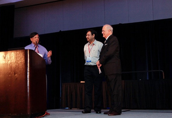 Debatosh (M) with Raj Mittra (L) and Don Wilton, RMTG Committee Chair (R)